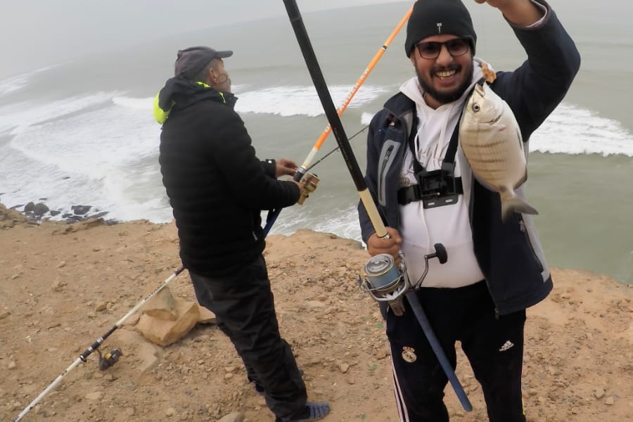 Scion courbé — signal de touche au surfcasting